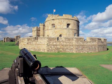 Pendennis Castle with a cannon in the foreground.