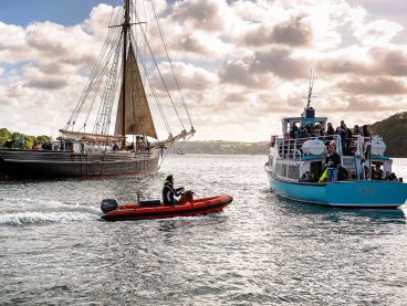 A ship, a ferry and a RIB on the River Fal.