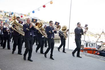 A marching band in a Cornwall fishing village.