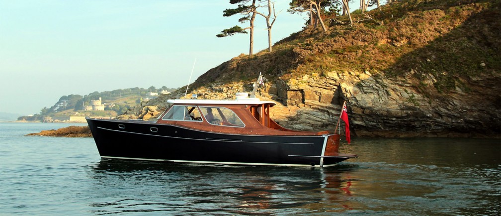 A boat at anchor in a secret cove.