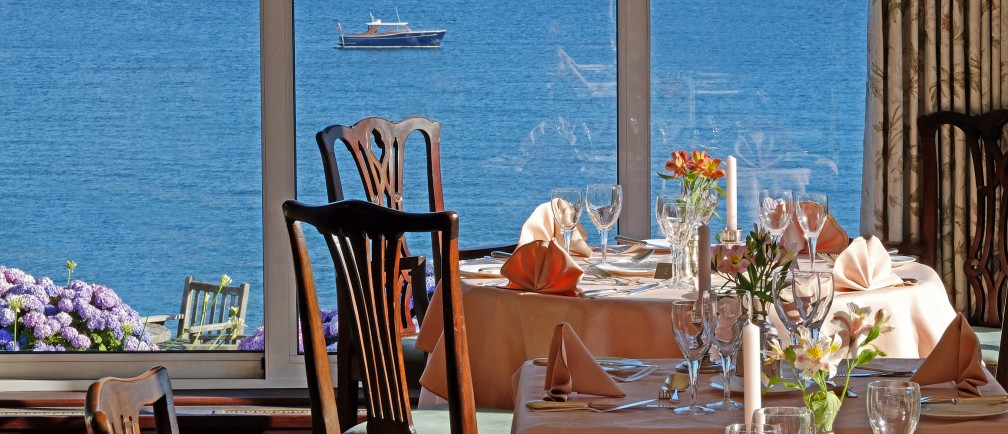 The dining room at The Nare hotel in Cornwall, with breathtaking sea views.