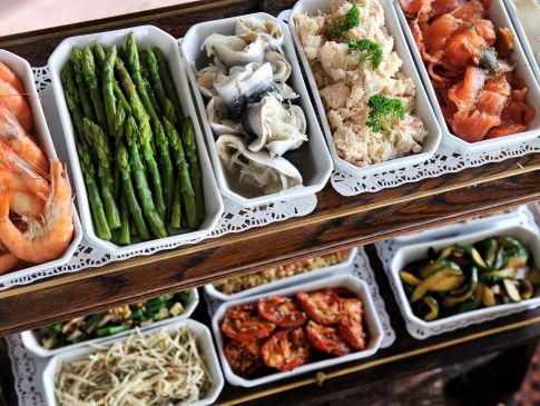 The hors d'oeuvres trolley at The Nare hotel, with trays of asparagus, prawns and rollmops.