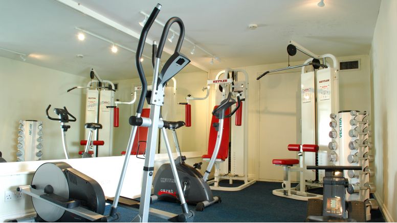 Exercise equipment in The Nare hotel's gym.