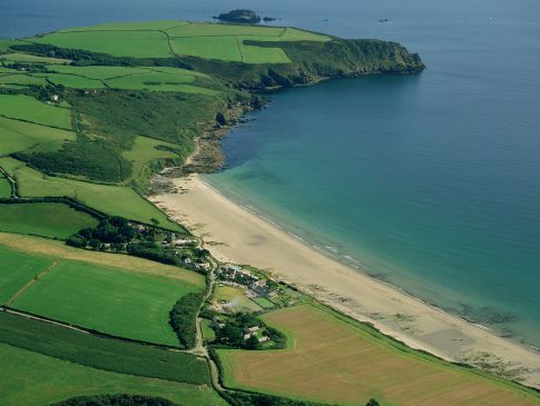 An aerial view of The Nare, Nare Head and Carne Beach in Cornwall.