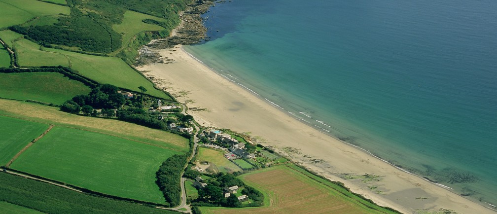 An aerial image of Carne Beach.