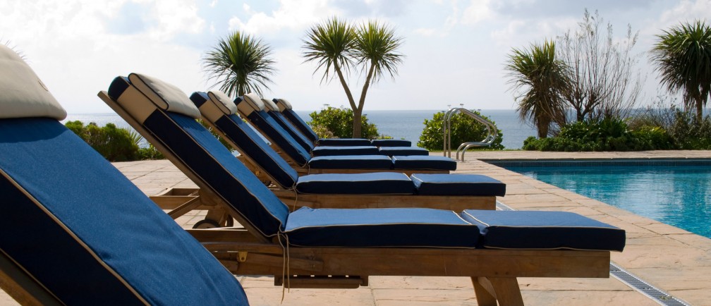 Sun loungers by the pool at Cornwall hotel The Nare.