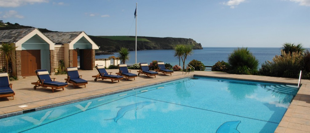 The outside swimming pool at The Nare, a hotel in Cornwall with sea views.