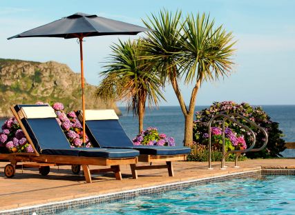 Poolside sun loungers.