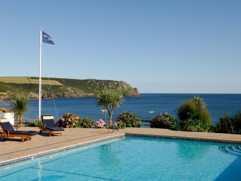 The Nare hotel's outside swimming pool, with views out to sea.
