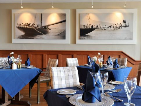 Tables set for service at The Quarterdeck restaurant in south Cornwall.
