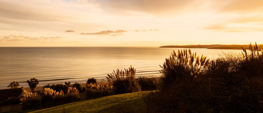 The view westward towards the Lizard from The Nare Hotel at dusk