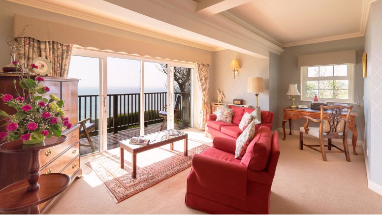 The sitting room in The Nare, a luxury hotel with sea views.