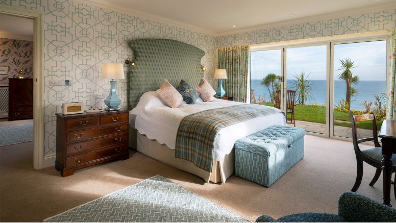 A master bedroom in a luxury suite at The Nare Hotel