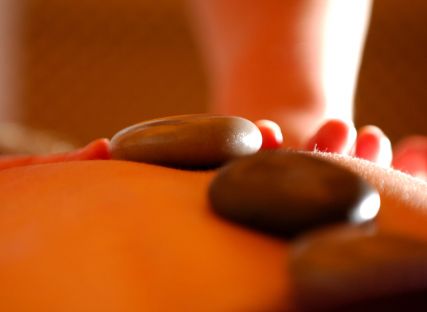 A hot-stone massage treatment.