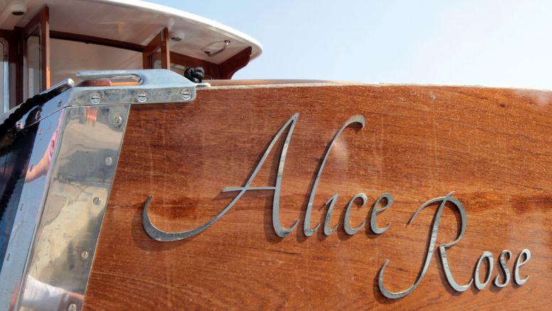 'Alice Rose' – the name of The Nare's boat – in metal script on the boat's body.