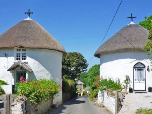 Thatched round houses in Veryan, Cornwall.